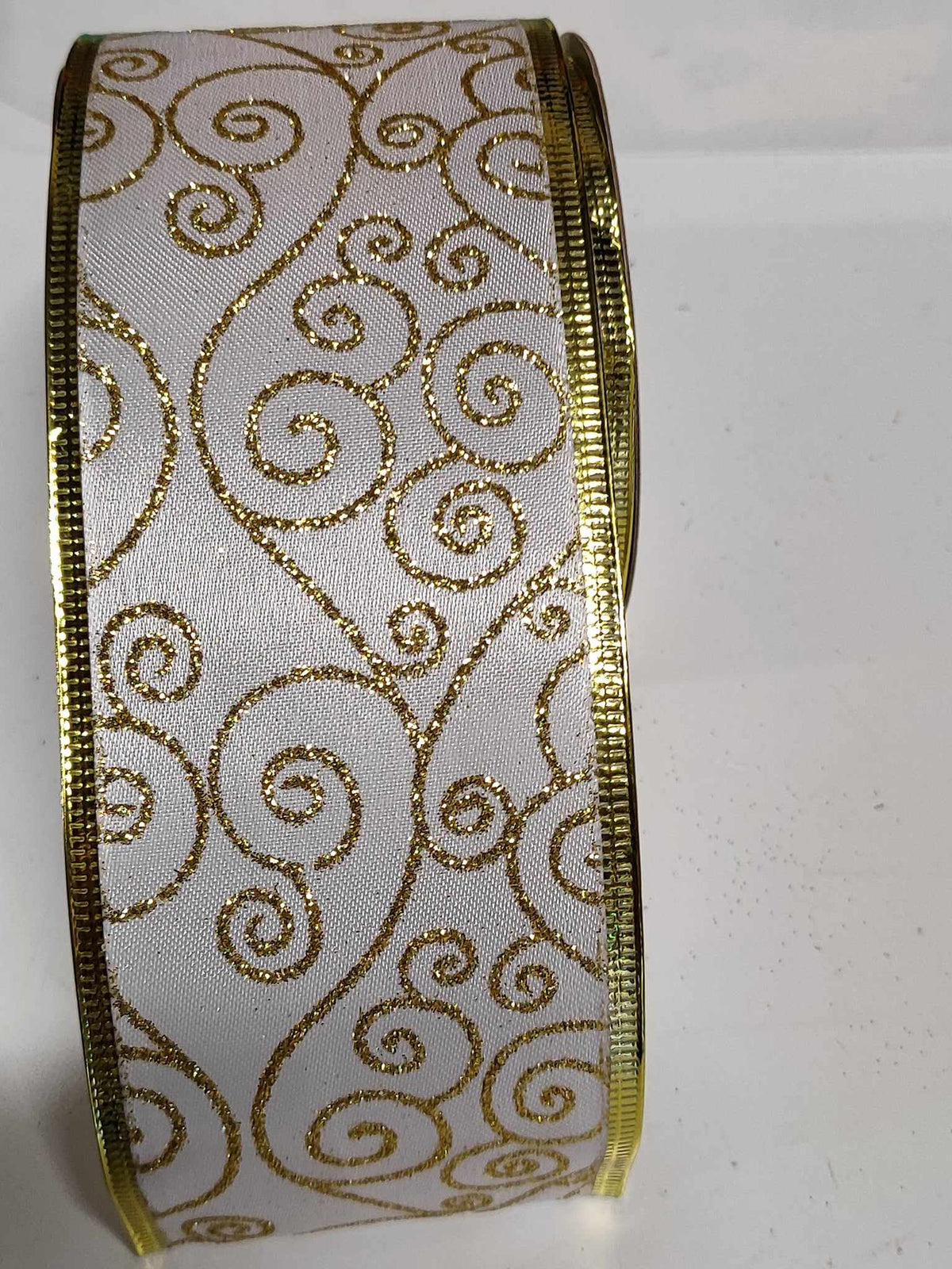 Christmas Ribbon Swirl's 63mm x 10yrds gold