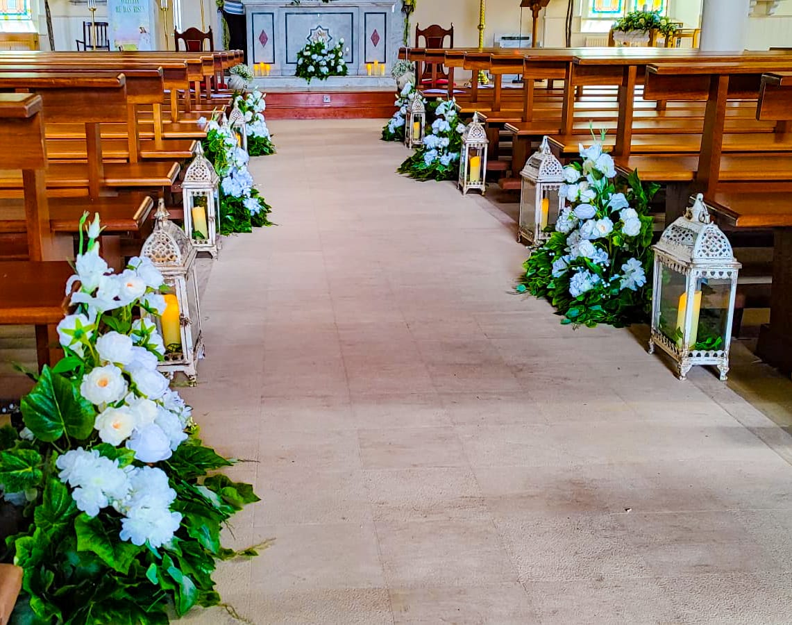 Meadow wedding package aisle florals and white ceremony arch