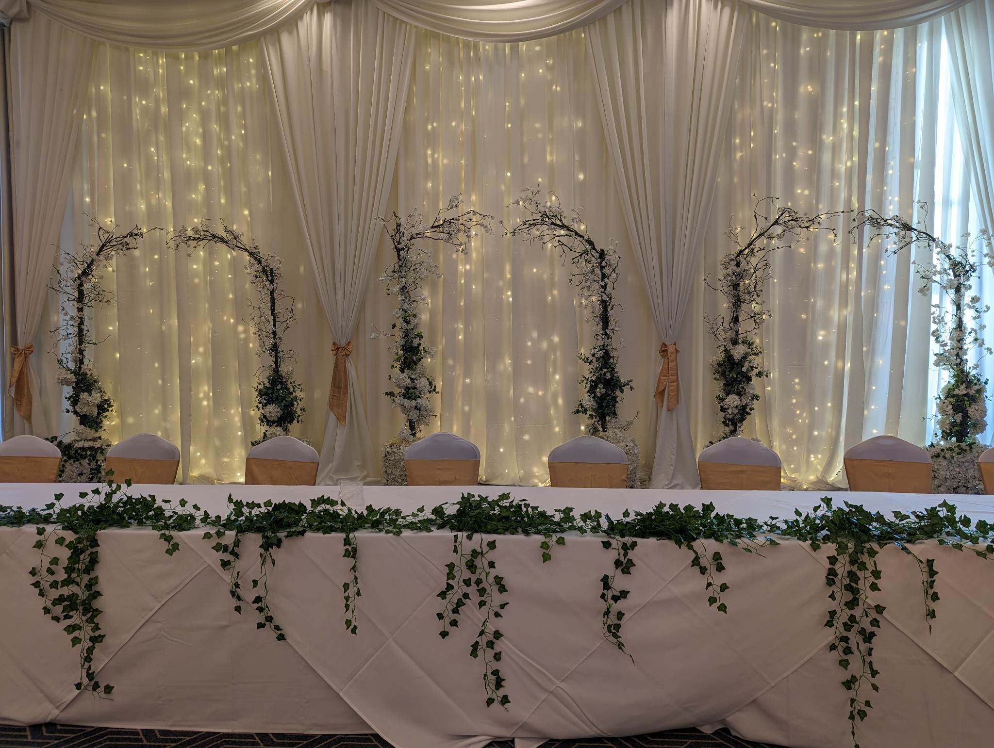 Wedding decor deposit product for reserving an Evergreen Silk Plants package